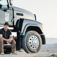 What are the hardships faced by truck drivers around the world?