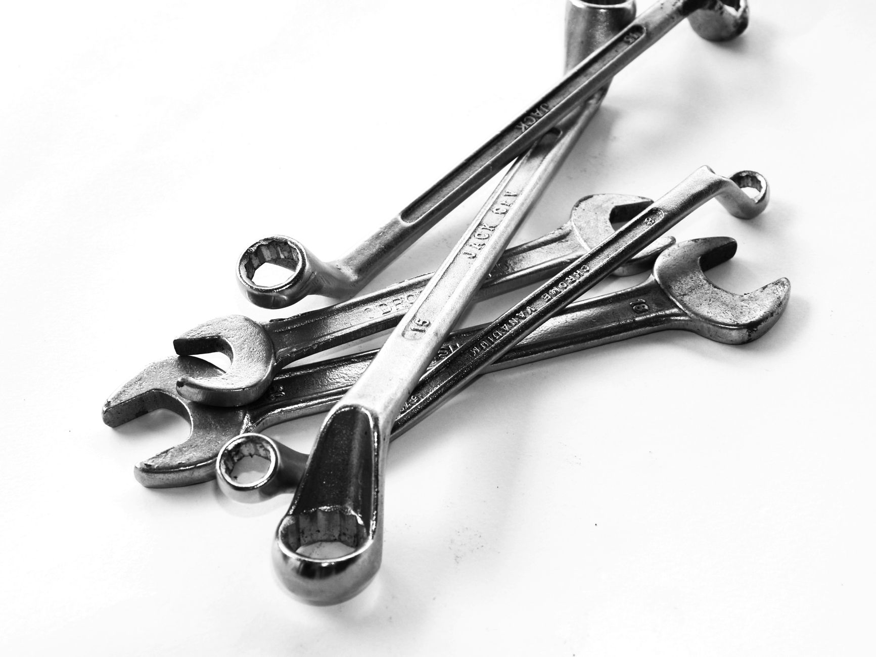 A collection of steel wrenches displayed against a white backdrop, perfect for toolkits. — Giving Your Fish a Great Environme